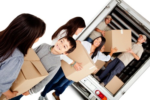 Office removals in Putney planning with moving boxes and desks