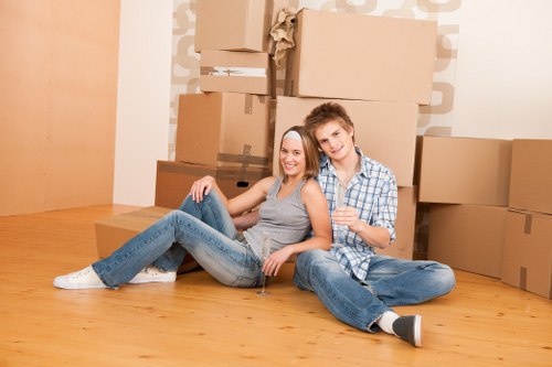 Prepared boxes and belongings ready for a moving truck in Putney