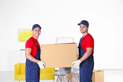 Local transfer station receiving separated cardboard, metal, and appliances