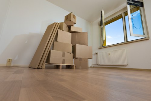 Organised moving boxes labelled for unpacking in Putney