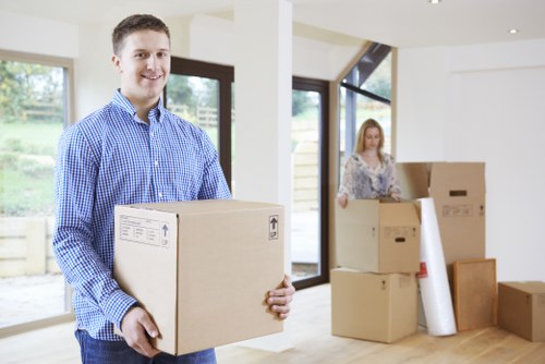 Local Putney moving crew unloading items at a new home