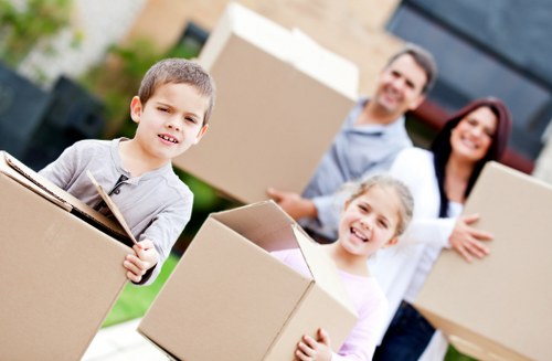 Packing boxes carefully for home moves in Putney
