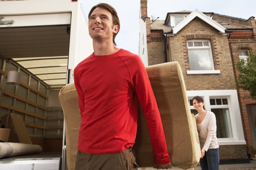 Loading furniture into a moving truck in Putney