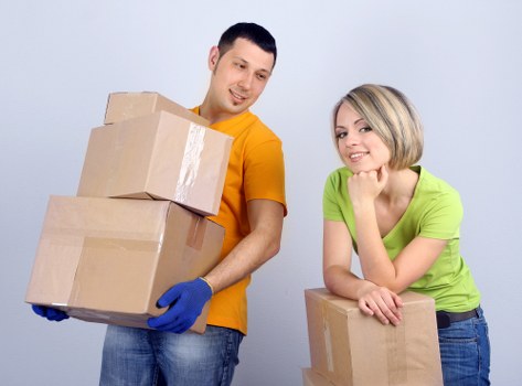 Professional office relocation team handling furniture and equipment in Putney