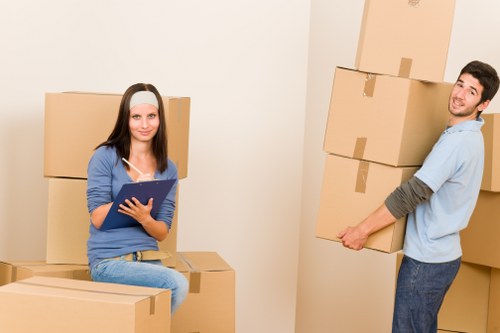 Organized storage unit in Putney with packed boxes and furniture